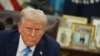 President Donald Trump speaks to reporters as he signs executive orders in the Oval Office of the White House, Jan. 31, 2025, in Washington. 