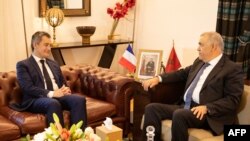 FILE—Morocco's Interior Minister Abdelouafi Laftit (R) receives his counterpart from France Gerald Darmanin in Rabat on April 22, 2024.