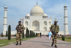Central Industrial Security Force (CISF) personnel patrol at the historic Taj Mahal premises, where U.S. President Donald Trump and first lady Melania Trump are expected to visit, in Agra, India, Feb. 20, 2020.