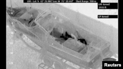 Аэрофотоснимок, полученный с помощью инфракрасной камеры, подтвердил местонахождение Джохара Царнаева в лодке. Уотретаун, Бостон. 19 апреля 2013 года