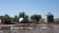 Farm buildings in Johnstown, Colo., are damaged following this past week's floods, Sept. 17, 2013.