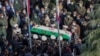 Cuma günü öldürülen nükleer bilimadamı Muhsin Fahrizade'nin cenaze töreni büyük bir katılımla haftabaşında Tahran'da yapıldı.