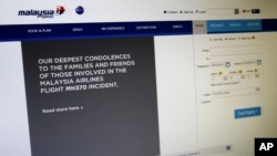 A sympathy message is displayed at the webpage of the Malaysia Airlines website, in Shah Alam, outside Kuala Lumpur, Malaysia, March 25, 2014.