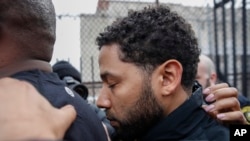 'Empire' actor Jussie Smollett leaves Cook County jail following his release, Feb. 21, 2019, in Chicago.