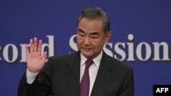 中國外長王毅星期四（3月7日）在中國第十四屆全國人大二次會議外交記者會上。