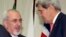 U.S. Secretary of State John Kerry (R) shakes hands with Iranian Foreign Minister Mohammad Javad Zarif at the United Nations Palais in Geneva, Nov. 24, 2013. 