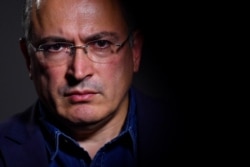 FILE - Mikhail Khodorkovsky, a former oil tycoon who fell foul of Vladimir Putin's Kremlin, is seen during an interview with Reuters at his office in central London, Britain, August 13, 2018.
