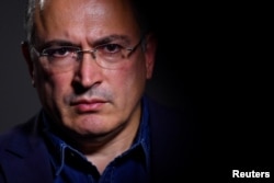 FILE - Mikhail Khodorkovsky, a former oil tycoon who fell foul of Vladimir Putin's Kremlin, is seen during an interview with Reuters at his office in central London, Britain, August 13, 2018.