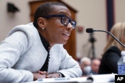 FILE - Harvard President Claudine Gay, left, speaks during a hearing of the House Committee on Education on Capitol Hill, Tuesday, Dec. 5, 2023 in Washington, D.C. (AP Photo/Mark Schiefelbein, File)