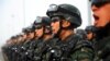 Paramilitary policemen stand in formation as they take part in an anti-terrorism oath-taking rally, in Kashgar, Xinjiang Uighur Autonomous Region, China, February 27, 2017.