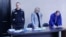 Jailed Russian opposition leader Alexei Navalny attends a court hearing in Pokrov
