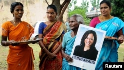 Women gather to celebrate the victory of Kamala Harris in Painganadu near the village of Thulasendrapuram, where Harris' maternal grandfather was born and grew up, in the southern state of Tamil Nadu, India, Nov. 8, 2020.