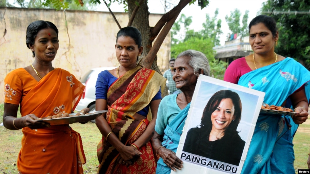 Women gather to celebrate the victory of Kamala Harris in Painganadu near the village of Thulasendrapuram, where Harris' maternal grandfather was born and grew up, in the southern state of Tamil Nadu, India, Nov. 8, 2020.