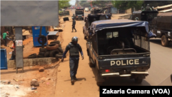 Des policiers et des manifestants lors d'une manifestation à Conakry, en Guinée, le 22 mars 2018. (VOA/Zakaria Camara)