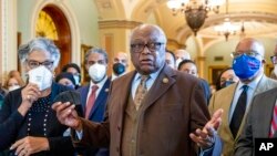 From left, Rep. Joyce Beatty, D-Ohio; Rep. Steven Horsford, D-Nev.; House Majority Whip Jim Clyburn, D-S.C.; Rep. Bennie Thompson, D-Miss., and other members of the Congressional Black Caucus speak about their support of voting rights legislation at the Capitol, Jan. 19, 2022. 