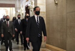 FILE - Rep. Jamie Raskin (D-MD) leads fellow House impeachment managers as they walk in the U.S. Capitol to hand-carry an article of impeachment against former President Donald Trump to the Senate for trial, Jan. 25, 2021.