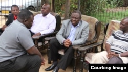 MDC-T leader Morgan Tsvangirai and other party officials at the funeral wake of the late Benson 'Okollo' Muchineuta. (Photo/MDC-T Facebook Page)