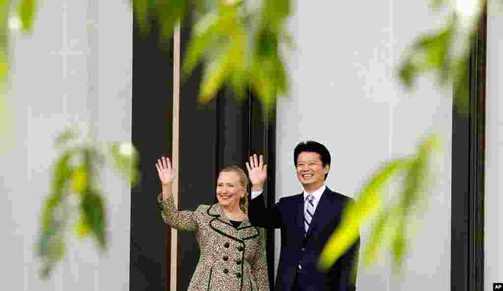 Clinton with Japanese Foreign Minister Koichiro Gemba before a working lunch in Tokyo, July 8.