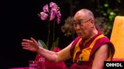 His Holiness the Dalai Lama answering questions from the audience during his talk in celebration of 'Ahimsa - India Day' at the London Coliseum in London, England on September 20, 2015. (Photo/Ian Cumming)