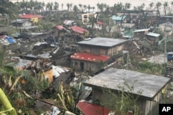 This photo provided by the MDRRMO Viga Catanduanes, shows damaged houses caused by Typhoon Man-yi in Viga, Catanduanes province, northeastern Philippines, Nov. 17, 2024.