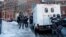 SWAT team officers arrive at a building at Harvard University in Cambridge on Dec. 16, 2013.