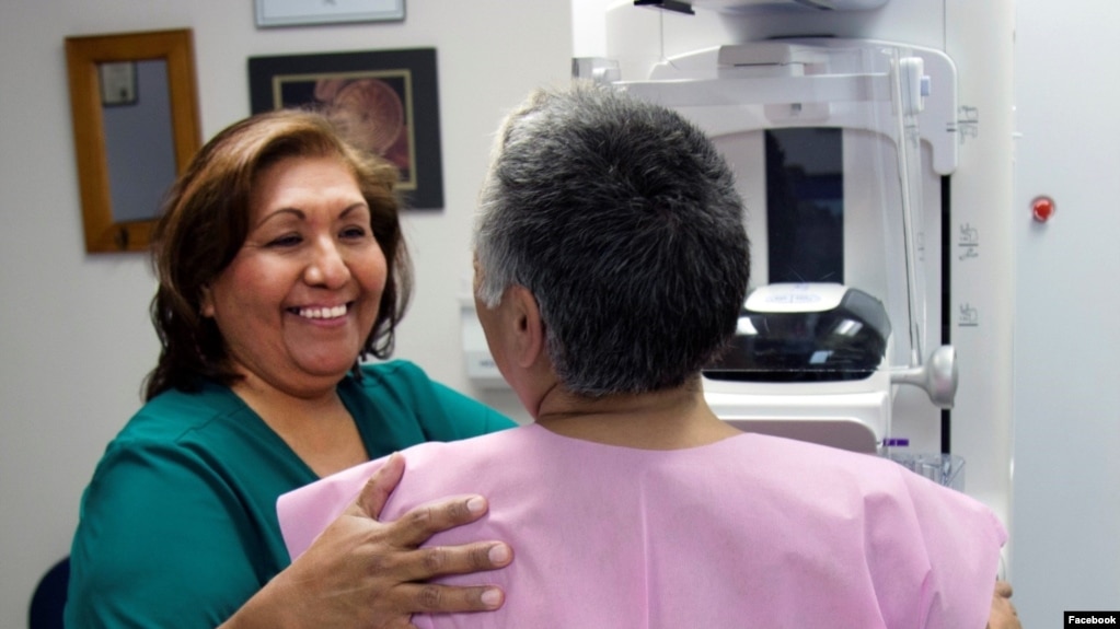 Photo shows a patient at the Phoenix Indian Medical Center (PIMC) preparing for a mammogram. Facebook/Indian Health Service/PIMC