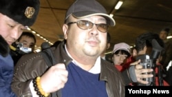 FOLE - Kim Jong Nam is pictured at the Beijing International Airport, China, Feb. 2007. He was killed on Feb. 13, 2017 at Kuala Lumpur International Airport. 