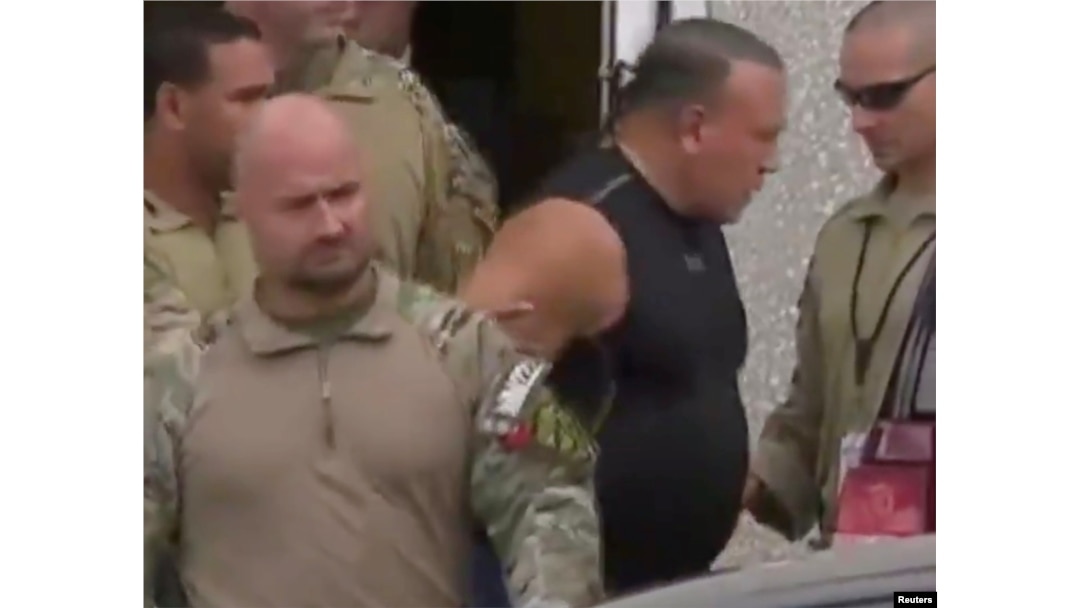 Cezar Sajok (u crnoj majici), osumnjičeni za slanje bombi u poštanskim kovertama (Foto: Reuters)