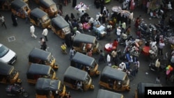 FILE - Autorickshaws much like these in central Hyderabad, India, were launched as part of a pilot program in the trendy Melville suburb of Johannesburg, South Africa in 2012, just one sign of growing ties between India and African nations.