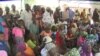 Nigerian women at a meeting with Cameroon authorities, Makary, Cameroon, April 7, 2019. (M. Kindzeka/VOA)