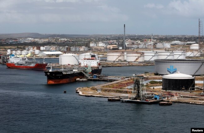 Crude oil tankers are docked at Isla Oil Refinery PDVSA terminal in Willemstad on the island of Curacao, Feb. 22, 2019.