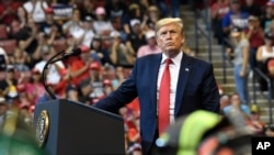 President Donald Trump speaks at a campaign rally in Sunrise, Fla., Nov. 26, 2019. 