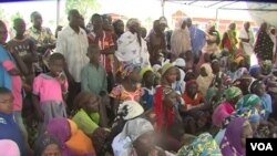 Nigerian women at a meeting with Cameroon authorities, Makary, Cameroon, April 7, 2019. (M. Kindzeka/VOA)