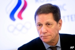 Russian Olympic Committee President Alexander Zhukov speaks to the media after a Russian Olympic committee meeting in Moscow, Russia, Dec. 12, 2017.