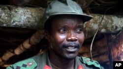 FILE - Joseph Kony, leader of the Lord's Resistance Army during a meeting with a delegation of 160 officials and lawmakers from northern Uganda and representatives of non-governmental organizations, July 31, 2006, Congo near the Sudan border.