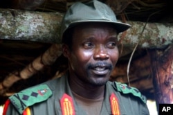 FILE - Joseph Kony, leader of the Lord's Resistance Army during a meeting with a delegation of 160 officials and lawmakers from northern Uganda and representatives of non-governmental organizations, July 31, 2006, Congo near the Sudan border.