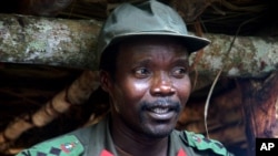 FILE - Joseph Kony, leader of the Lord's Resistance Army, is seen during a meeting with officials and lawmakers from northern Uganda, on the DRC's border with Sudan, July 31, 2006.