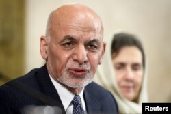 FILE - Afghan President Ashraf Ghani speaks during a U.N. conference on Afghanistan, Nov. 28, 2018, at U.N. offices in Geneva, Switzerland.