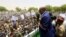 Sudanese President Omar Hassan al-Bashir addresses the crowd during a campaign rally in East Darfur, April 5, 2016.