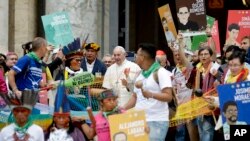 Pope Francis walks in procession on the occasion of the Amazon synod, at the Vatican, Oct. 7, 2019.