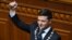 UKRAINE -- Ukrainian President Volodymyr Zelenskiy holds the presidential stamp during his inauguration ceremony at the parliament in Kyiv, May 20, 2019