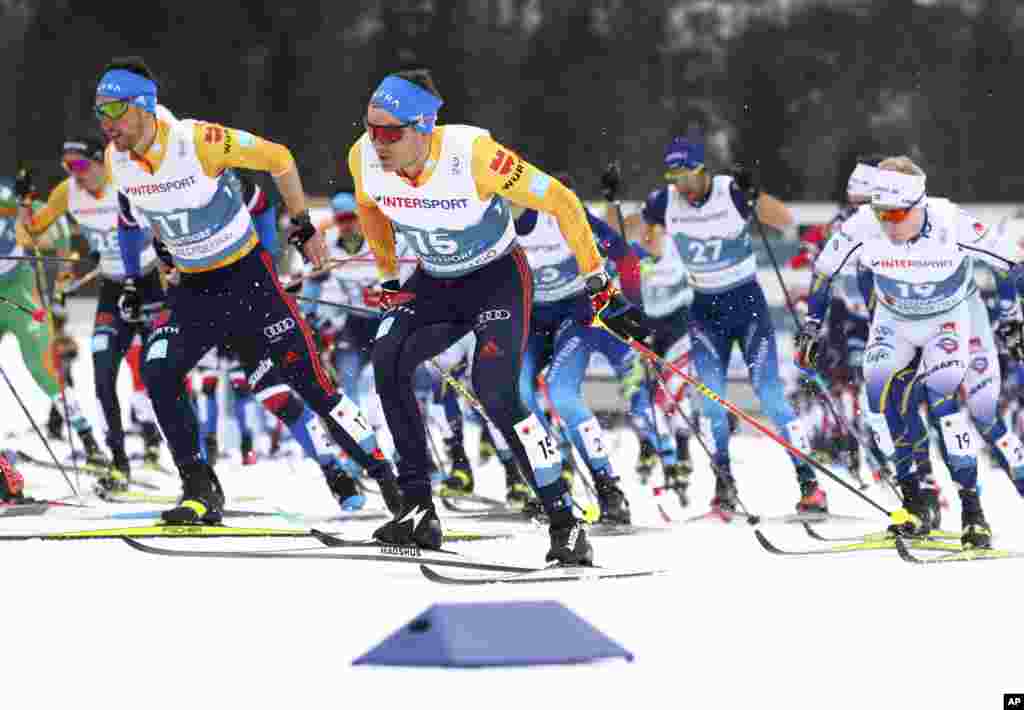 USA&#39;s Gus Schumacher, second left, competes during the WSC Men&#39;s Mass Start 50km Classic cross country event at the FIS Nordic World Ski Championships in Oberstdorf, Germany.