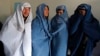 Afghan Men Don Burqas, Take to Streets for Women's Rights