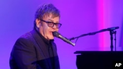 Elton John performs at the 20th Annual Race to Erase MS Event "Love to Erase MS" at the Hyatt Regency Century Plaza on May 3, 2013 in Los Angeles.