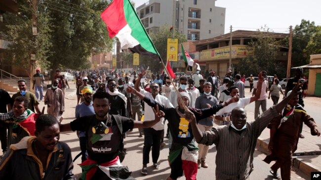 Thousands of people take to the streets in Khartoum, Sudan, Jan. 17, 2022, to protest the Oct. 25, 2021 coup that has plunged the country into grinding deadlock.