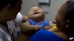 Caio Julio Vasconcelos, born with microcephaly, undergoes therapy at the Institute for the Blind in Joao Pessoa, Brazil, Feb. 25, 2016. U.S. researchers are assisting in the effort to determine whether Zika is causing babies to be born with unusually small heads.