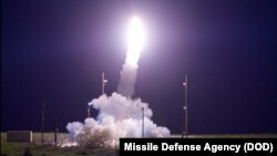 A Terminal High Altitude Area Defense (THAAD) interceptor is launched from the Pacific Spaceport Complex Alaska in Kodiak, Alaska, during Flight Test THAAD, July 11, 2017. 