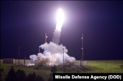 FILE - A Terminal High Altitude Area Defense (THAAD) interceptor is launched from the Pacific Spaceport Complex Alaska in Kodiak, Alaska, during Flight Test THAAD (FTT)-18, July 11, 2017.