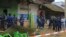 FILE - An area is cordoned off as police inspect the scene of a bomb explosion in Beni, DRC, Dec. 26, 2021. Islamic State claimed responsibility for the bombing, which officials blamed on the Allied Democratic Forces.