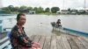 Pheav Soriya, 52, is a fish dealer in Bak Prea and a mother of five. She said of her Bak Prea village that “here in this place, I tell you frankly, our hope lies in water,” in Battambang province, on September 26, 2021. (Khan Sokummono/VOA Khmer)